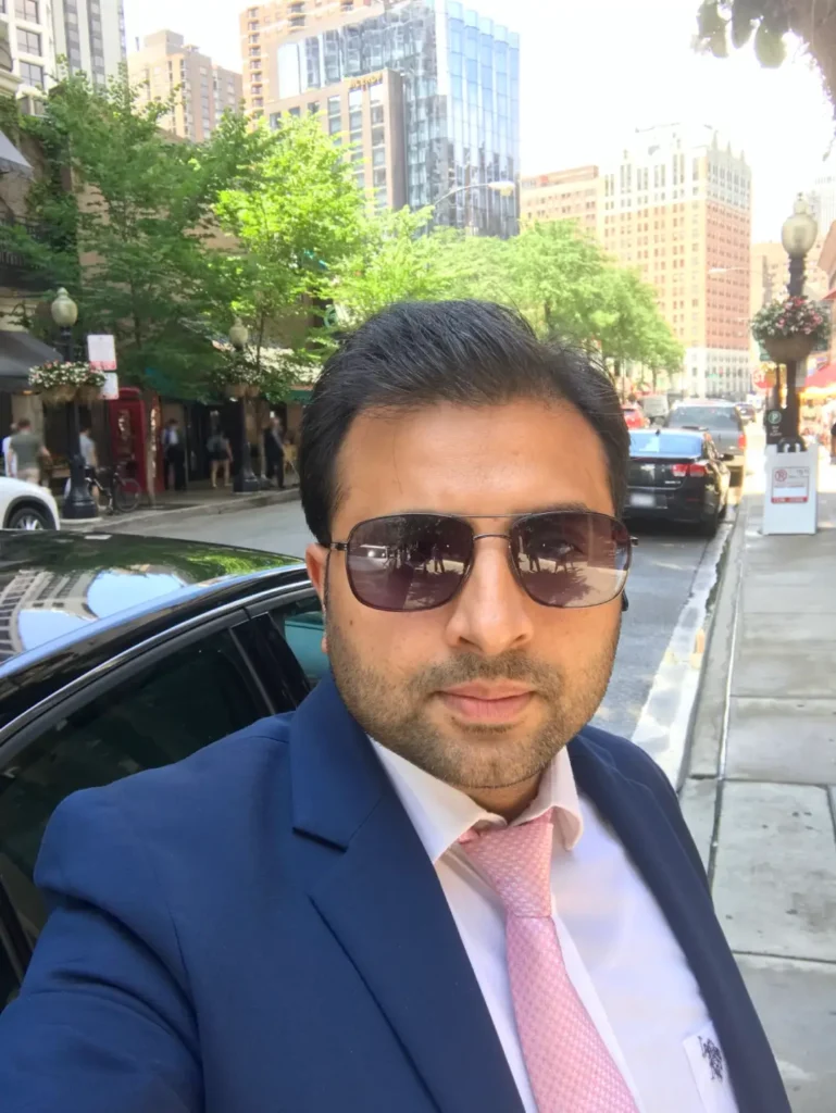 Chauffeur with Black Car