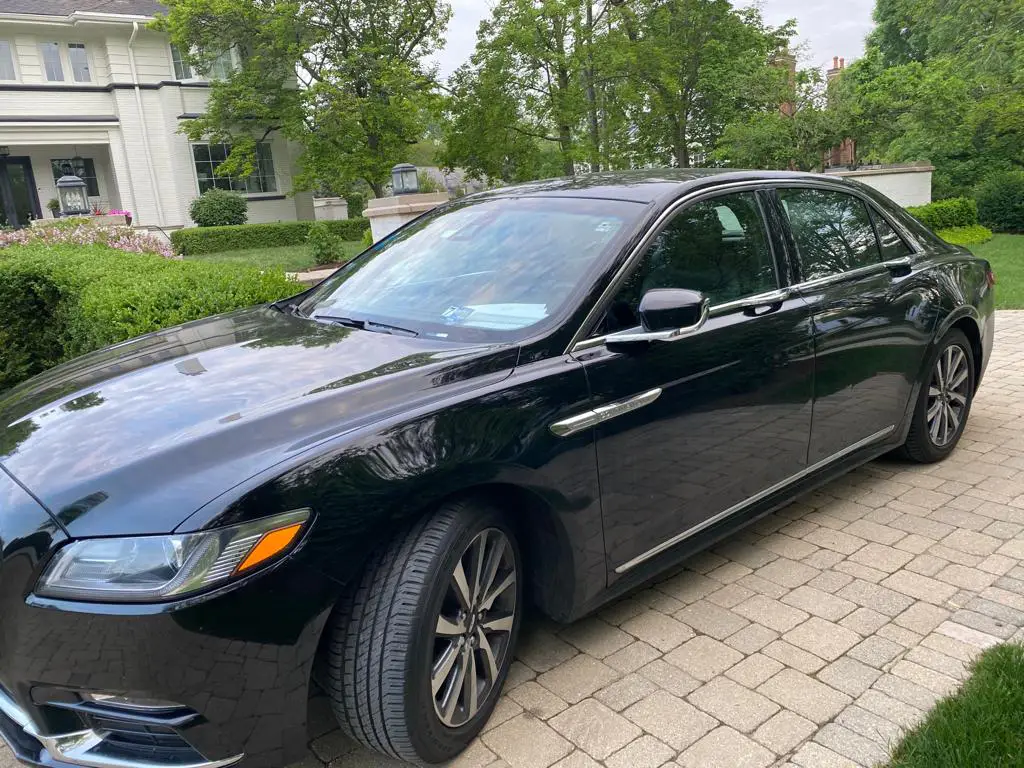 Lincoln Continental in driveway